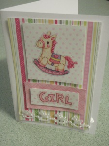 Baby girl rocking horse card