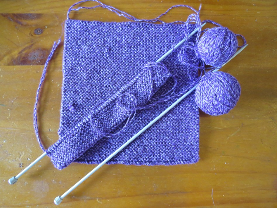 Knitting purple squares